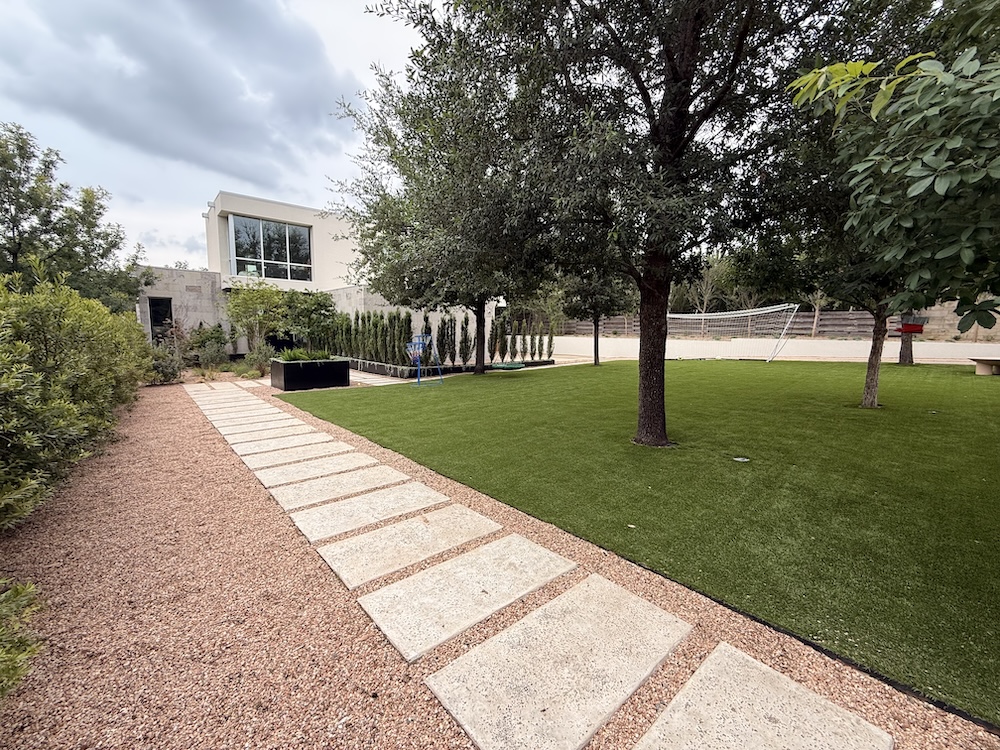 Modern Backyard with Stone Path & Turf